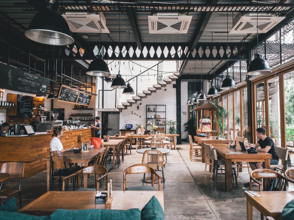 View of large industrial style restaurant. 